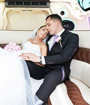 Husband and Wife inside a Wedding Limousine